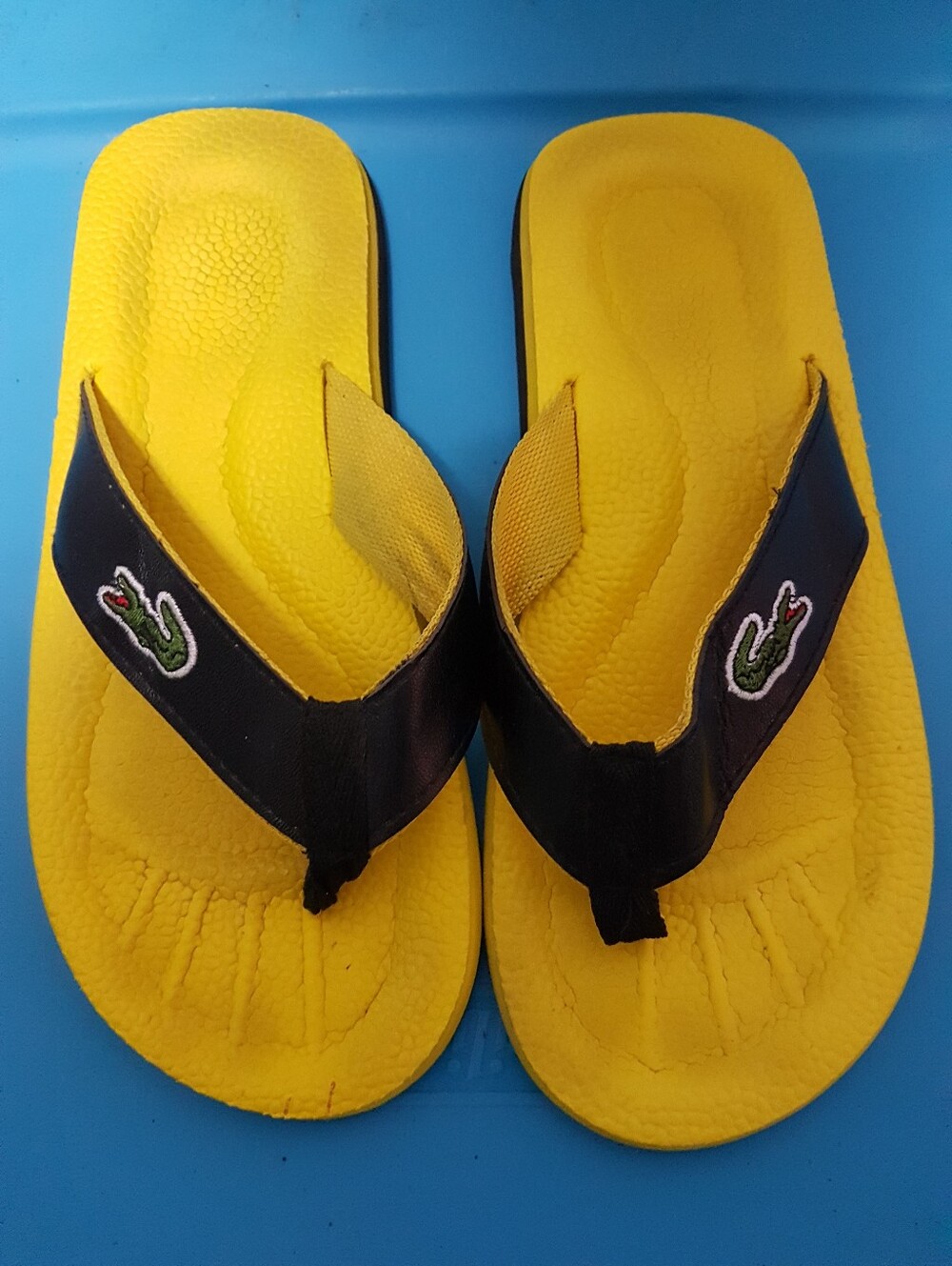 Lacoste Yellow and Black Logo Flip-Flops